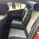 The rear has ample leg and headroom, but the front seats are far back in this picture